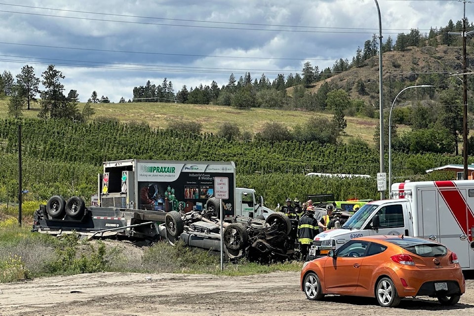 A two vehicle collision flips a truck on Highway 97 N past YLW, on June 12. 