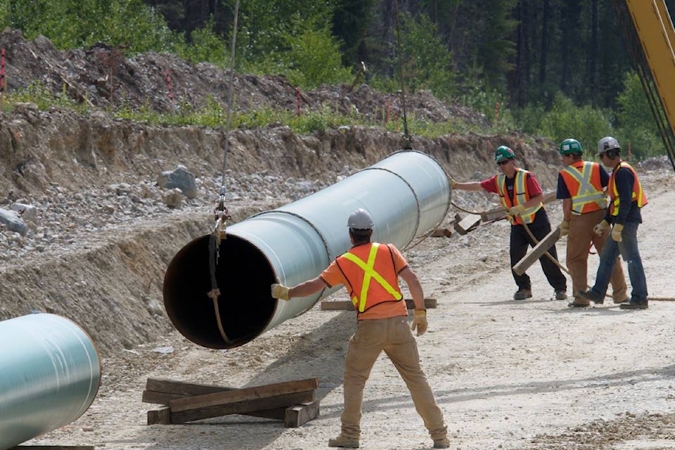 web1_170309-BPD-M-Kinder-Morgan-Trans-Mountain-pipeline-construction-file-photo-KMC