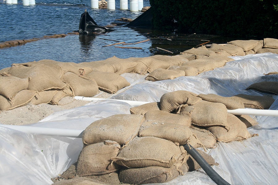 web1_170622-SUM-story-flood-sandbags_3