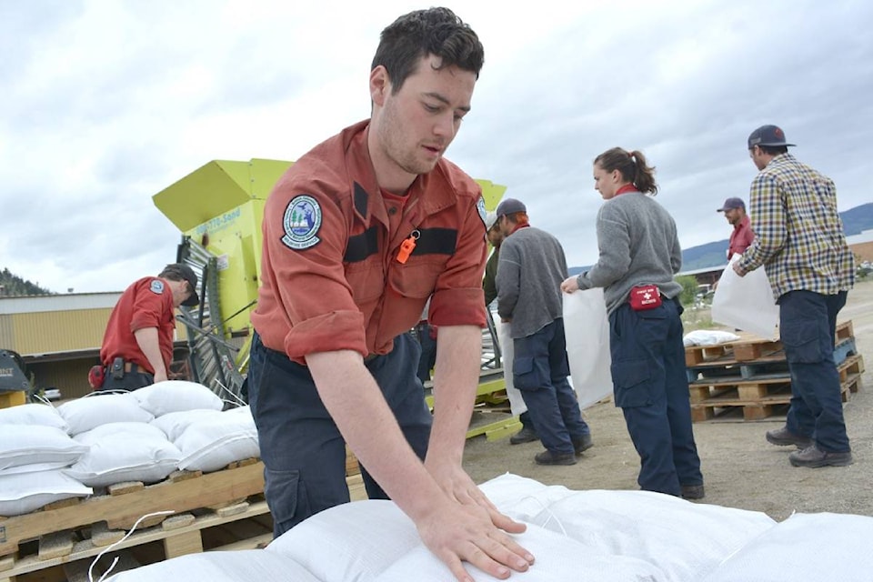 7673085_web1_170525-KCN-firefighters-packing-bags-copy