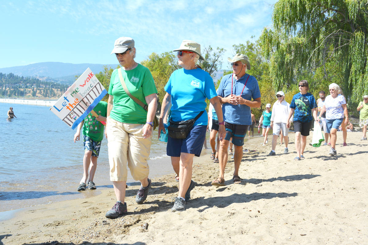 8267706_web1_170827-KCN-walk-the-beach2