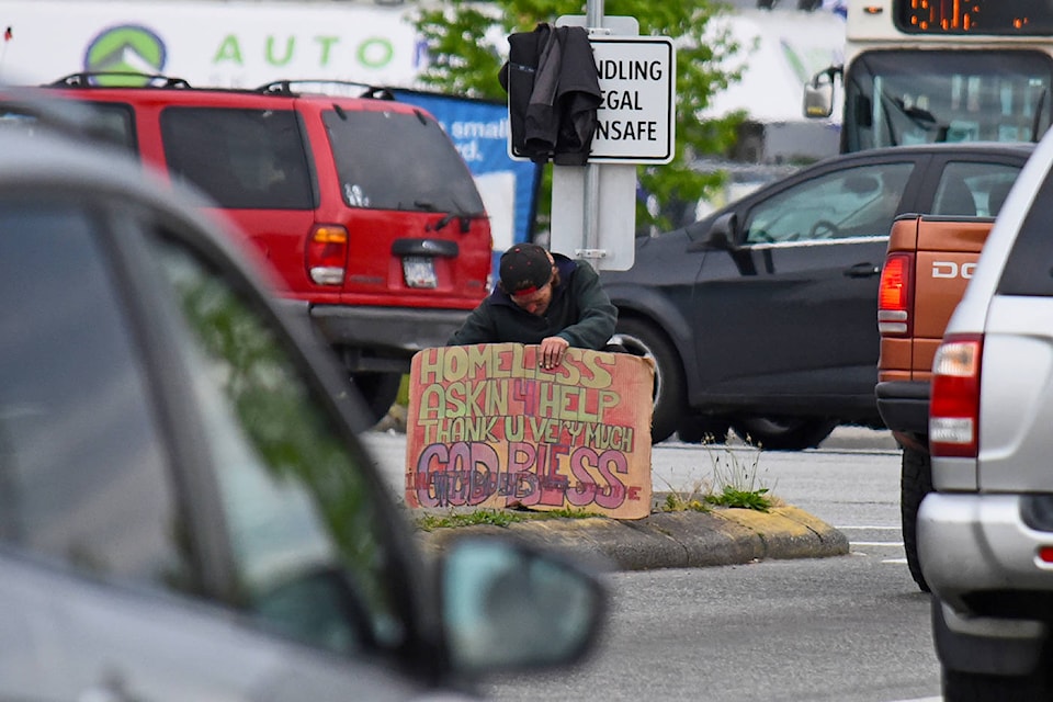 8955928_web1_170818-LAT-Panhandling