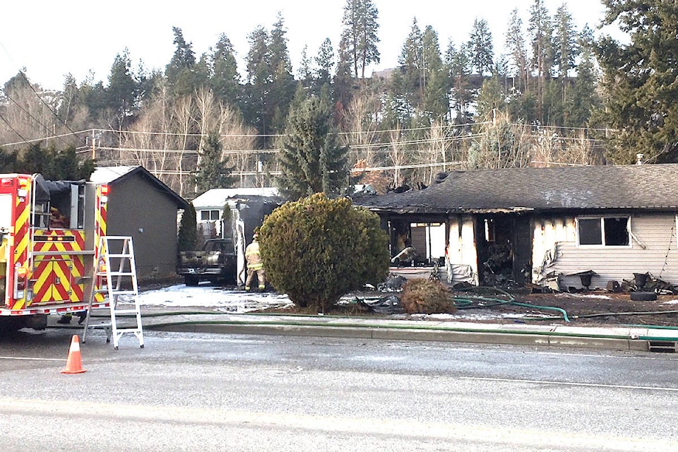 11008365_web1_burnt-out-house