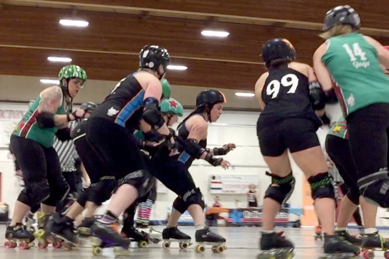 11865588_web1_180513-PWN-RollerDerby