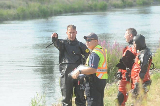 12829080_web1_180725-PWN-RCMP-divers-T