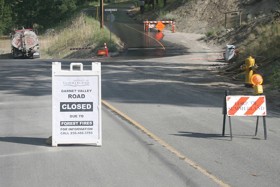 12841028_web1_180726-SUM-S-Evacuation-lifted-in-Summerland_1