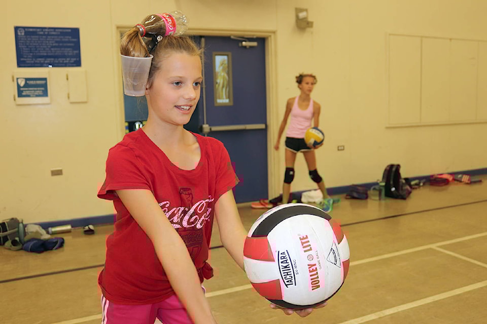 12879697_web1_180727-VMS-vballcamp1