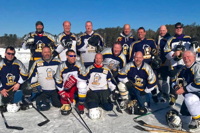 15663633_web1_190222-VMS-PondHockey2