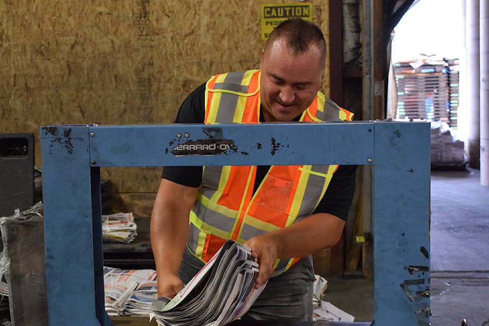 Black Press BC South Division President Dave Hamilton worked a night shift on the alphaliner at the Vernon press this week. (Caitlin Clow - Vernon Morning Star)