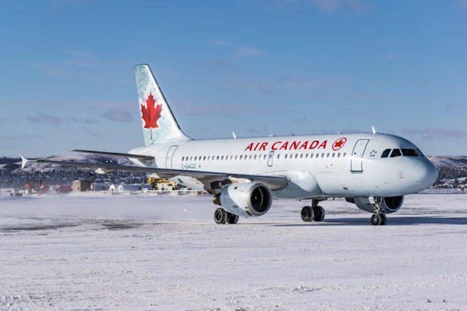 20031272_web1_19980792_web1_air-canada-in-snow-700x462