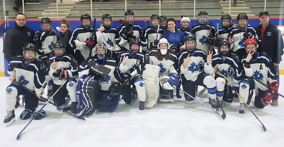 20831672_web1_200312-SUM-Female-hockey-HOCKEY_2