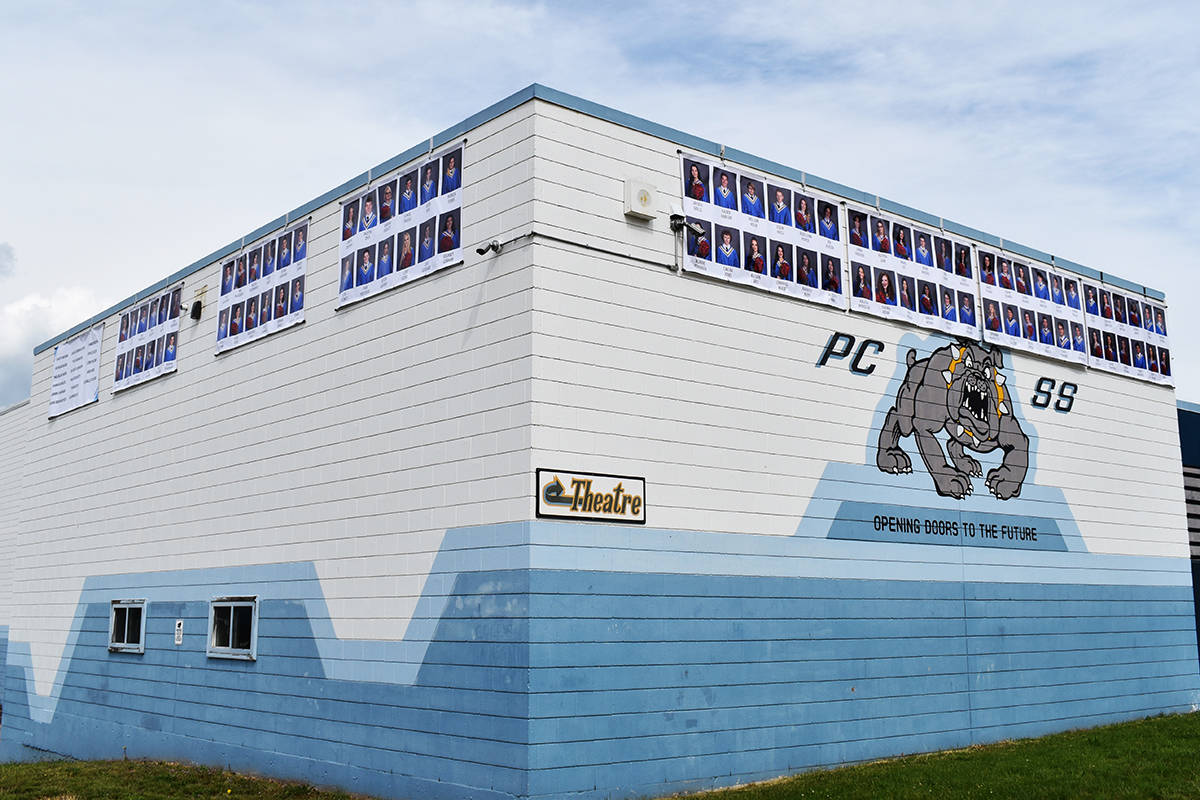 Outside of Prince Charles Secondary was strewn with pictures of the grad class for all to see. (Photo: Robert Wisla)