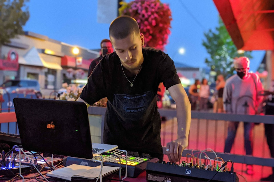 21-year-old ambient artist Tahal made his live debut at Saint-Germain Café and Gallery in downtown Penticton Thursday, Aug. 27, 2020 in front of a socially distanced crowd that was spread across both sides of Main Street. The  local, originally from Switzerland, was opening for Penticton band Yarrows. (Jesse Day - Western News)