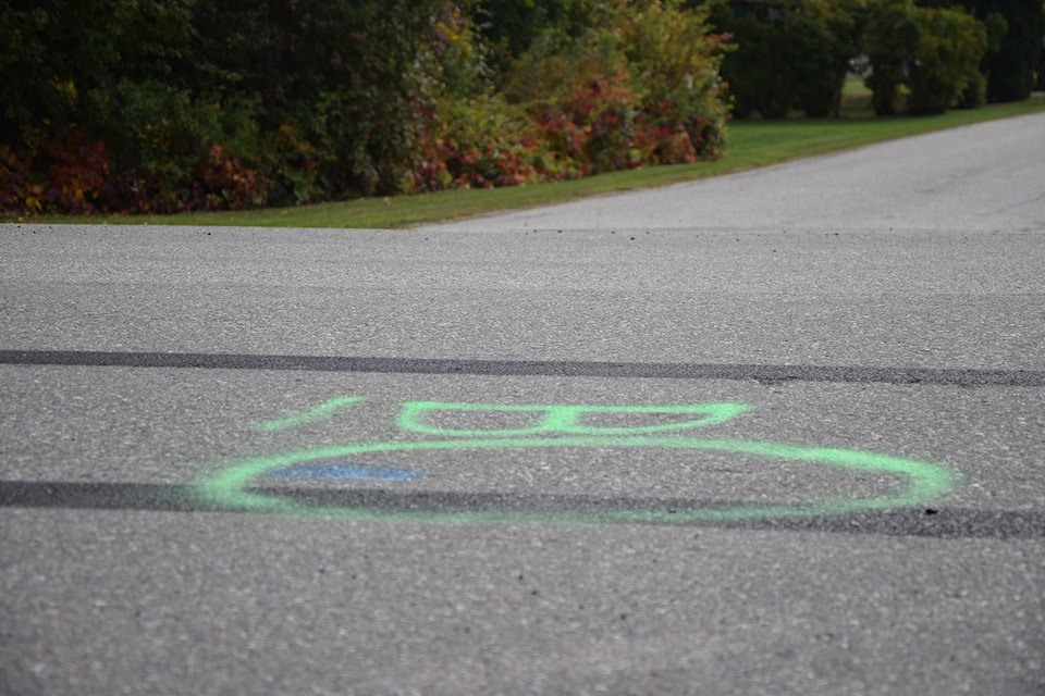 Vernon North Okanagan RCMP responded to reports of a man in medical distress Oct. 1, 2020. An investigation closed Kalamalka Road around Howe Drive for several hours. Spray paint marks reddish stains along the roadway. (Caitlin Clow - Vernon Morning Star)