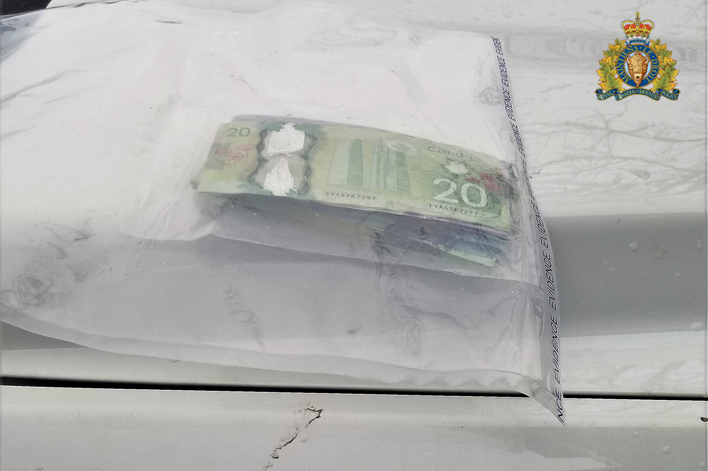 Cash seized from suspect following robbery. (RCMP)