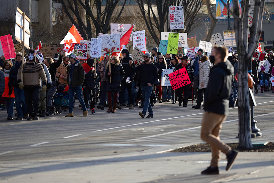 Anti-mask protesters blocked traffic downtown Kelowna today. (Phil McLachlan - Capital News)