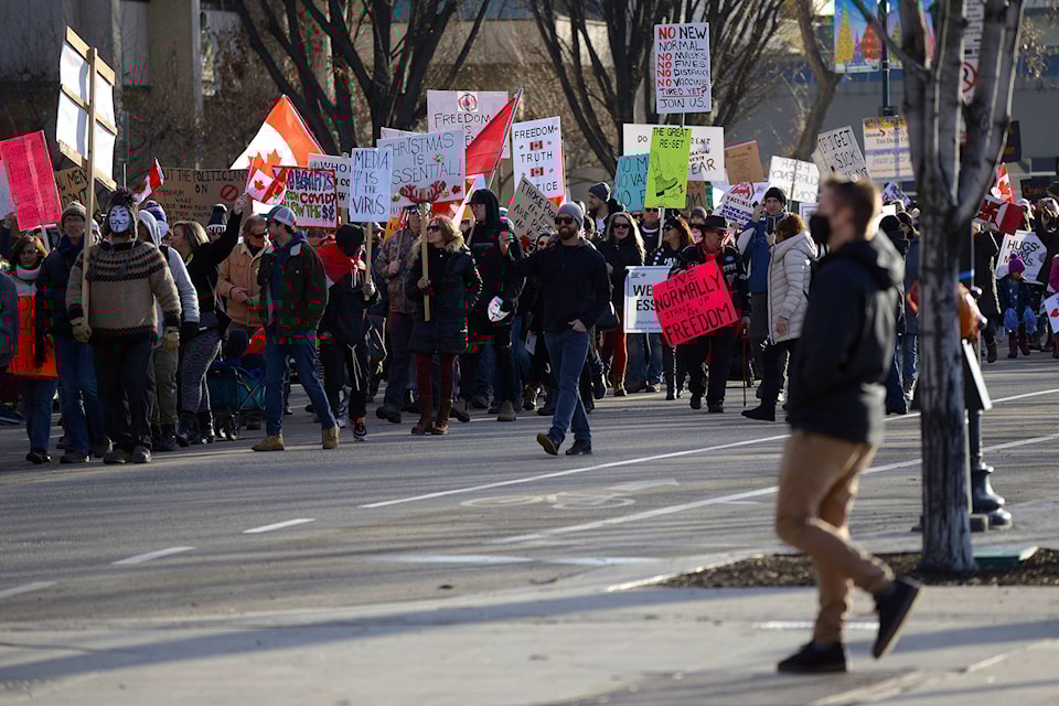 Anti-mask protesters blocked traffic downtown 鶹ѡ today. (Phil McLachlan - Capital News)