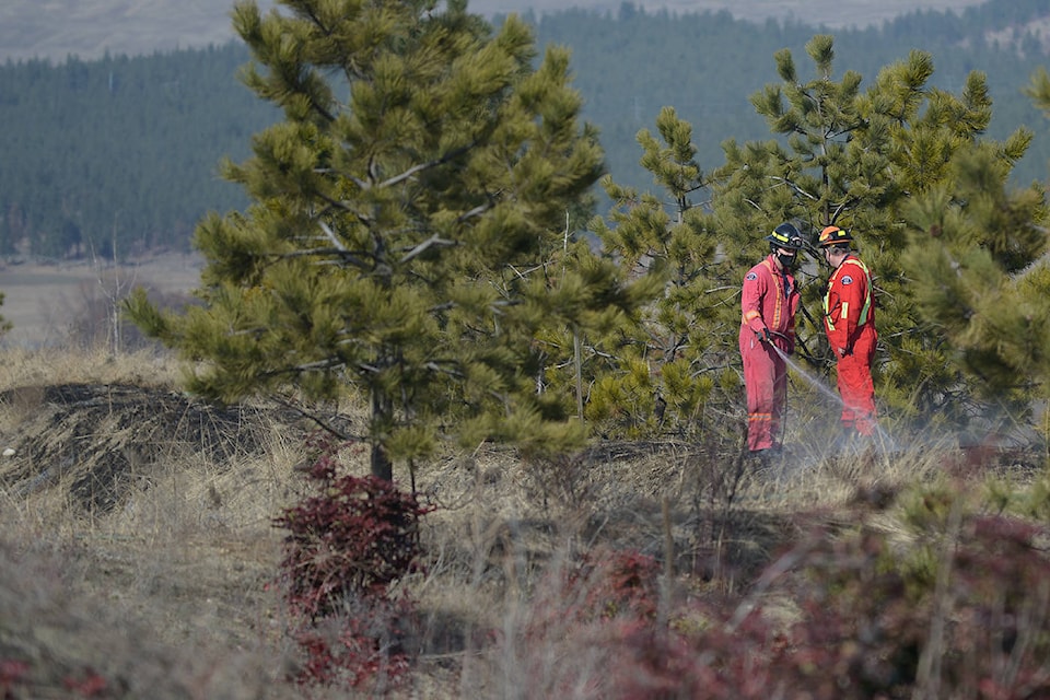 Grass fire off Pier Mac Way. (Phil McLachlan, Kelowna Capital News)