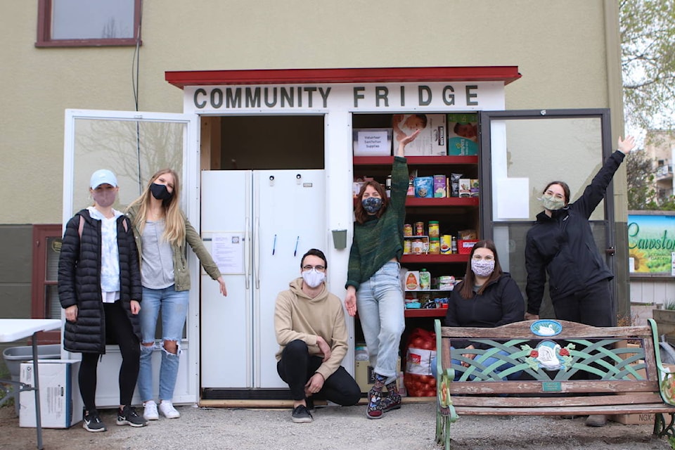 The group of volunteers behind Kelowna’s Community Fridge during its launch day on April 24. From left to right: Amie Rand, Lexi Bentley, David Byres, Lauren St. Clair, Samantha Skinner and Annette Nicoletti-Carriere. (Aaron Hemens - Kelowna Capital News)