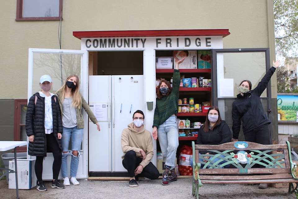 The group of volunteers behind 鶹ѡ’s Community Fridge during its launch day on April 24. From left to right: Amie Rand, Lexi Bentley, David Byres, Lauren St. Clair, Samantha Skinner and Annette Nicoletti-Carriere. (Aaron Hemens - 鶹ѡ)