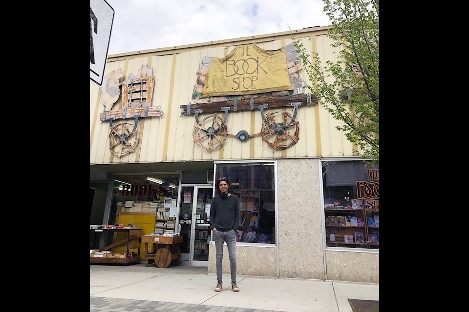 Tavis Stevenson, son of Pam and Bruce Stevenson, founders of The Book Shop on Main St, is the creator of the whimsical animal farm carts seen above The Book Shop. He also painted the book mural in the back alley behind the shop. (Monique Tamminga Western News)