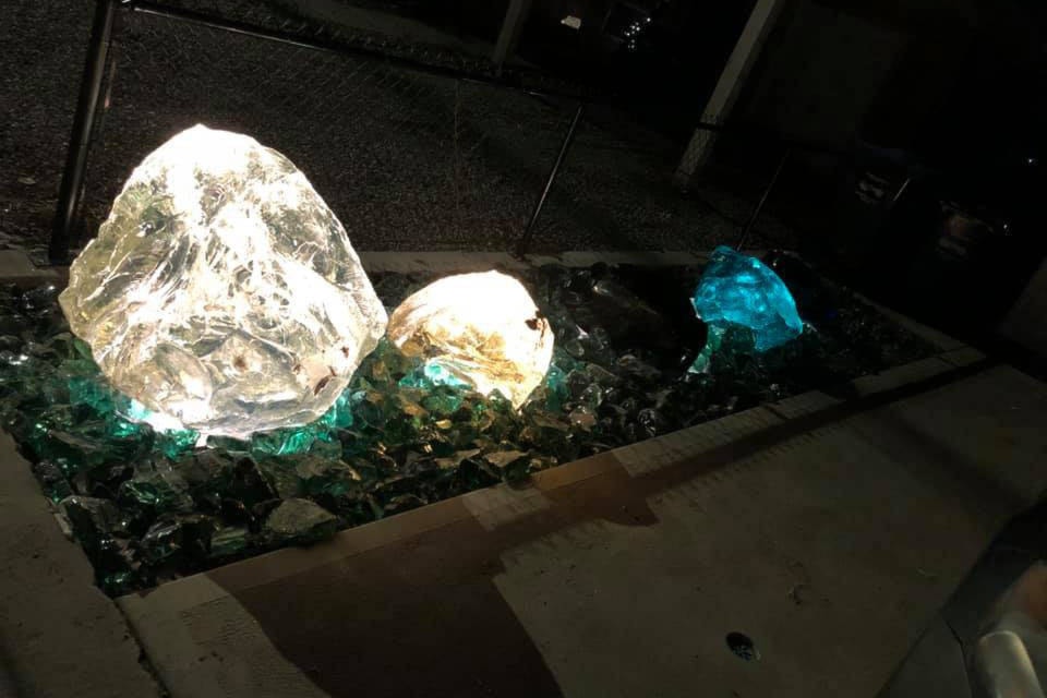 This is what the glowing boulders look like at night at 28 Huth Ave. (Submitted)