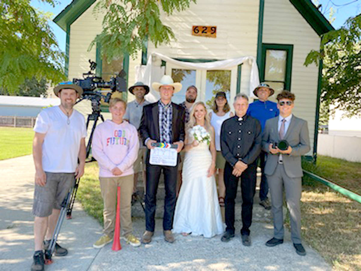 The cast and crew of 聭Put Your Hands Up聮 gather in front of Midway聮s Bridge drop-in centre, featured as a church in the music video. Photo courtesy of Javan Johnson