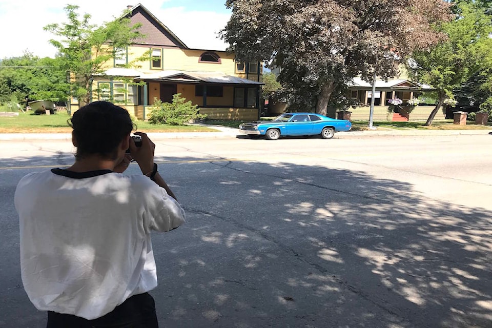 Maxime Vidricaire lining up a shot of a classic car on July 10. (Photo: Tim van der Krogt)