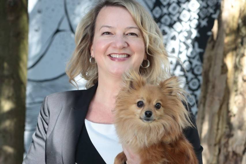 Marcie Moriarty and her dog Pip posing outside the BC SPCA in Vancouver, B.C. (supplied image)
