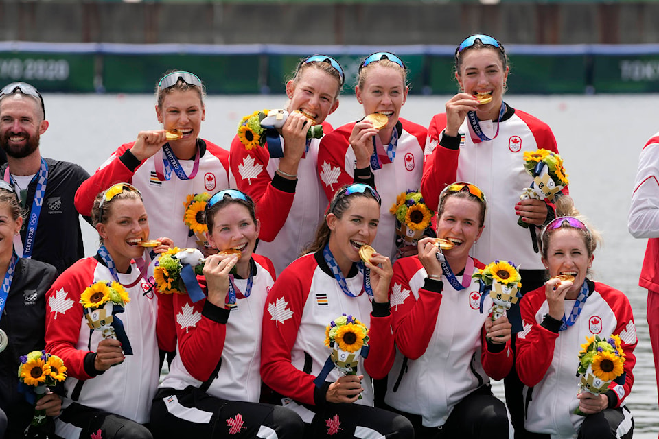 26096669_web1_210809-CPW-Canadian-final-Medallists-Tokyo-rowers_1