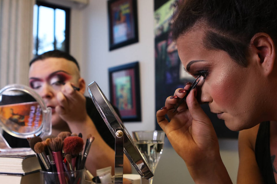 Kelowna drag queens Ella Lamoureux, right, and Jenna Telz prepare before a show at the Friends of Dorothy Lounge on Oct. 1. (Aaron Hemens/Capital News)