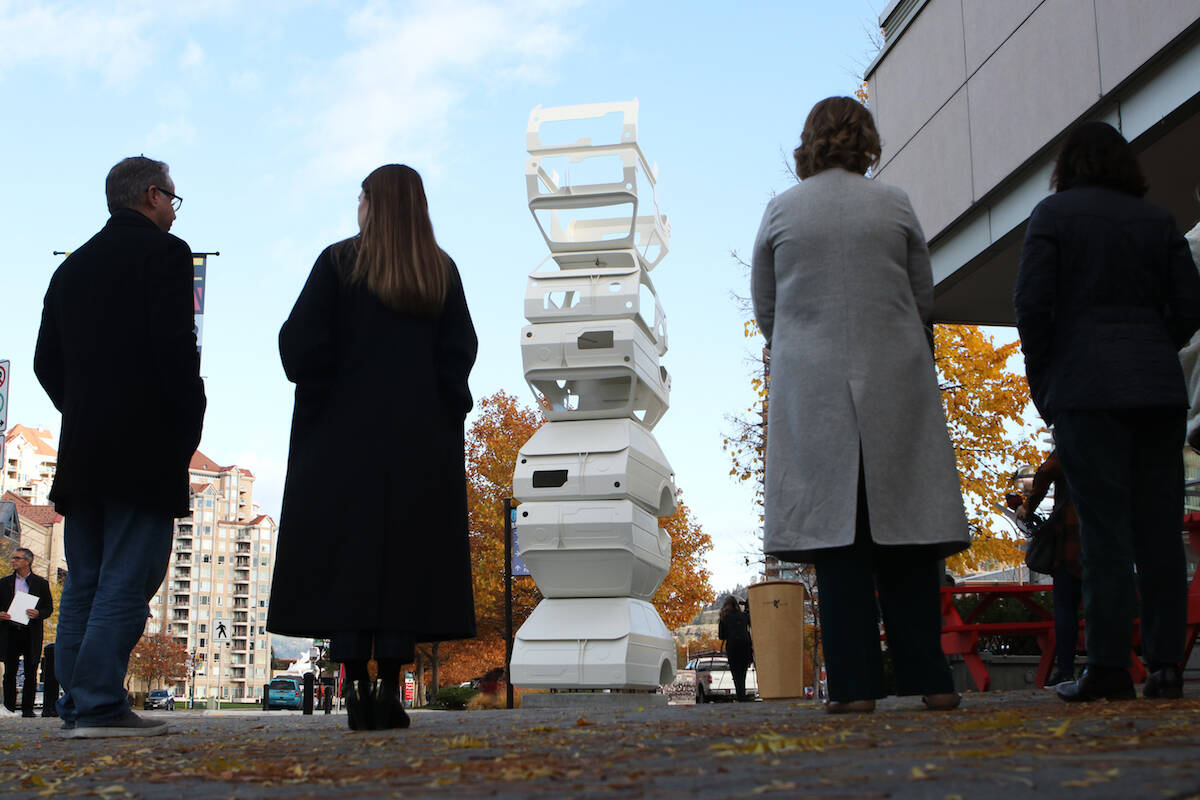 People gather for the unveiling of the 琉璃神社 Art Gallery聮s latest project - Jed Lind聮s Gold, Silver & Lead public sculpture - on Oct. 27. (Aaron Hemens/Capital News)