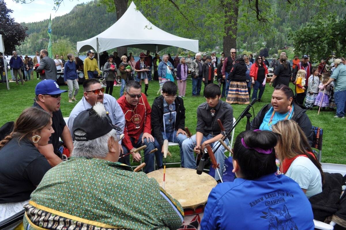 A Sinixt drum circle fills the air with song at Nelsons Lakeside Park. Photo: Tyler Harper