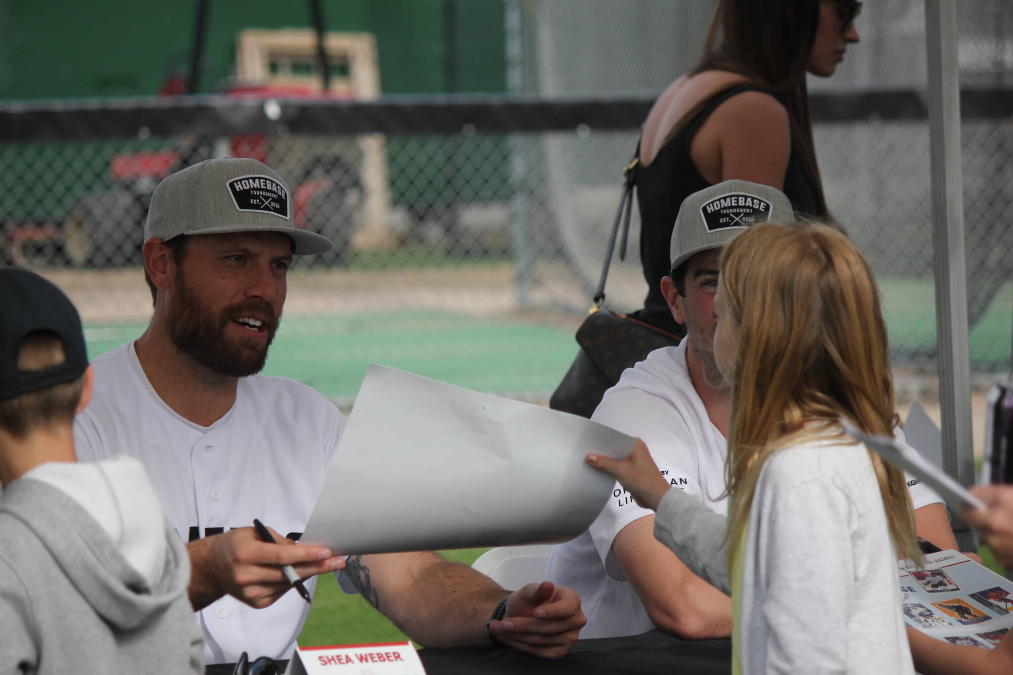 Shea Weber signs an autograph at the 2022 Homebase tournament. (Jake Courtepatte/Capital News)