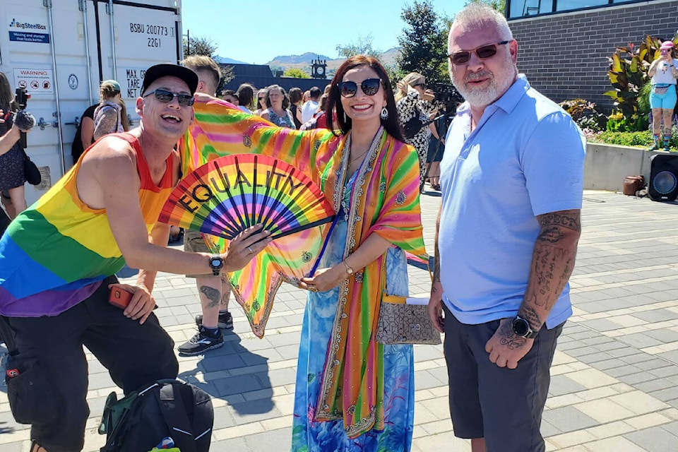 Vernon resident Garth Nelson (left) joins Vernon-Monashee MLA Harwinder Sandhu (centre) and Vernon Coun. Kelly Fehr in celebrating the first Pride Week in Vernon with the raising of the Pride Flag at city hall Monday, Aug. 8. (Roger Knox - Morning Star)