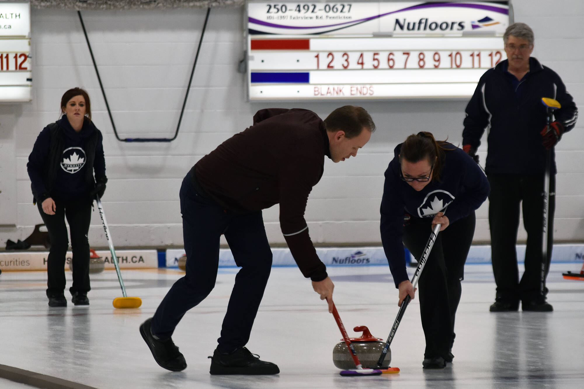 31068260_web1_200304-PWN-Sunday-Curling-Finals-Flare_4