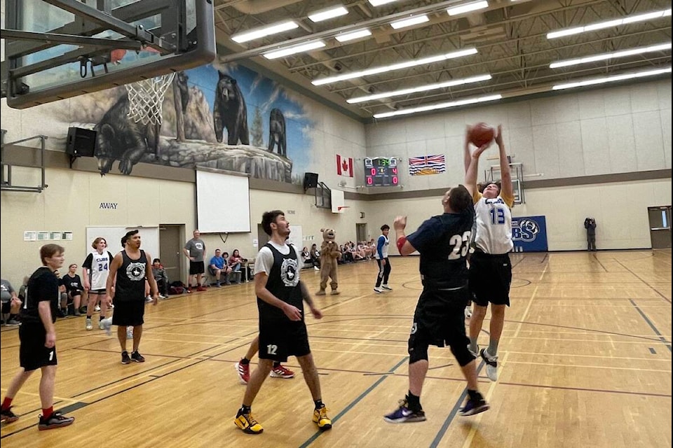 A charity basketball game took place at Cst. Neil Bruce School on Thursday afternoon (Feb. 16) between the grade eight boys and girls team combined and a team made up of members of the Westbank First Nation, West Kelowna Indigenous Policing Services, RCMP officers, and even former students. (Gary Barnes/Capital News)