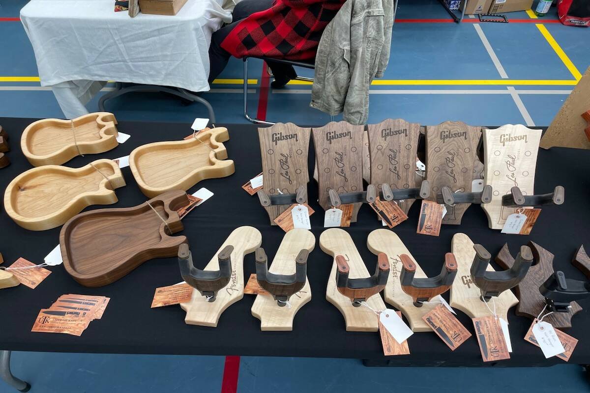 Guitar shaped wall hangers and catch all trays created by Gerard Cote. (Photo/Gary Barnes Capital News)