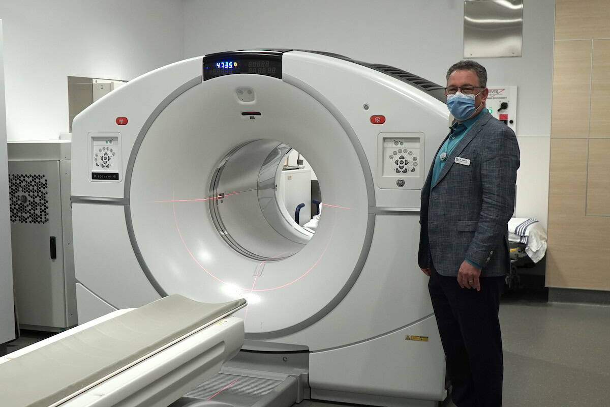 BC Cancer Kelowna Executive Medical Director, Dr. Ross Halperin stands beside a PET-CT scanner acquired by the centre in 2020. (Gary Barnes/Capital News)