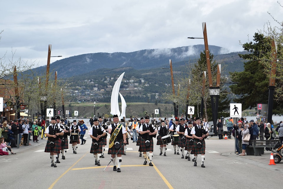 The Kelowna Pipe Band marched down Bernard Avenue in downtown Kelowna to celebrate their 100th anniversary. (Jordy Cunningham/Capital News)