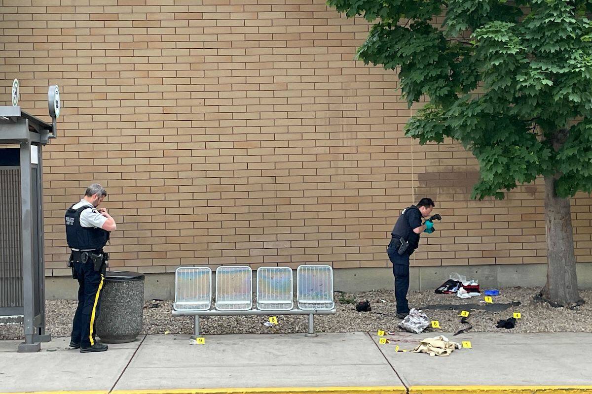Kelowna RCMP taking photos and collecting evidence after an individual was injured outside Orchard Park Shopping Centre. (Jordy Cunningham/Capital News)