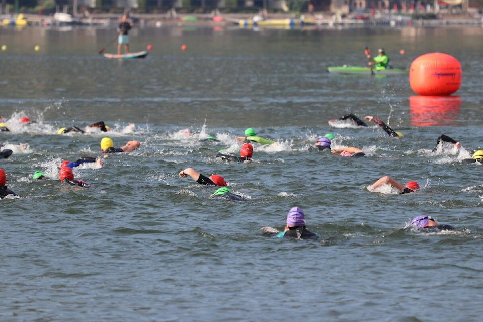 The starting of a triathlon is always hectic, with numerous competitors thrashing around in the water, looking to grab the best position at the annual Kal Rats triathlon, hosted at Okanagan Lake on Sunday, June 25. (Bowen Assman Photo)
