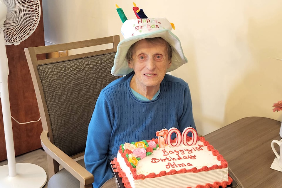Vernon Heritage Square resident Alma McGaughey celebrated her 100th birthday Wednesday, July 19, with family and fellow residents (Roger Knox - Morning Star)