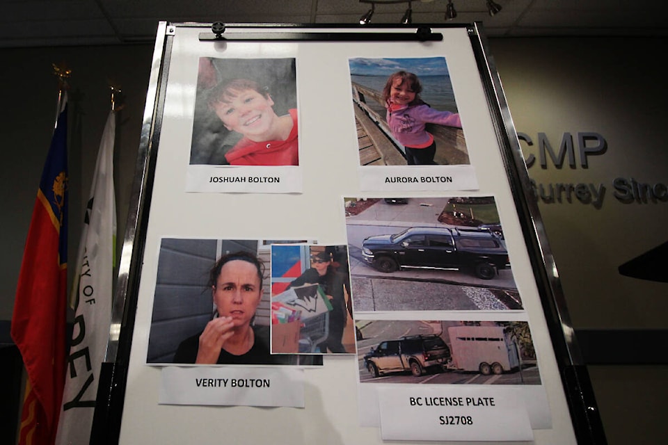 Surrey RCMP display a board of images of 10-year-old Joshuah Bolton, his sister eight-year-old Aurora, their mother Verity and the vehicle they㽶Ƶֱre believed to be in. Police provided updated surveillance images of the vehicle and Verity being spotted leaving a grocery story in Kamloops on July 15. (Lauren Collins)