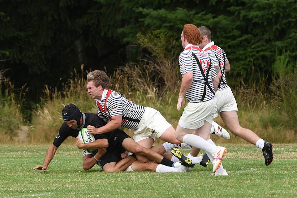 A Port Alberni Black Sheep player makes a long run with the ball deep into the Kelowna Crows’ end of a friendly game in Port Alberni on Friday, July 21, 2023. (SUSAN QUINN/ Alberni Valley News)