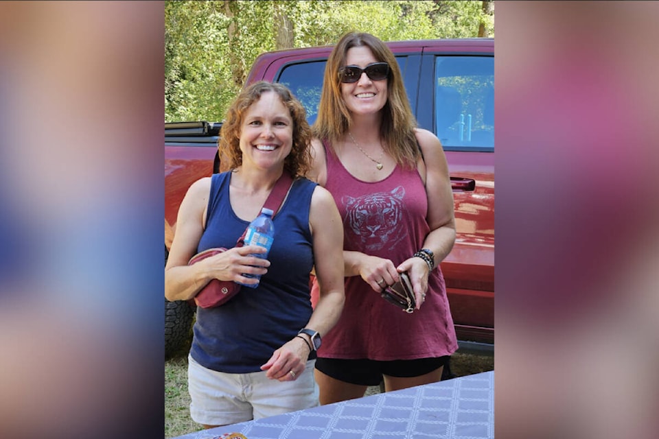 Carrie Sutch and Lisa Elder keep hydrated at the watering station during the 2023 Greater Vernon Bocce Open. (Contributed)