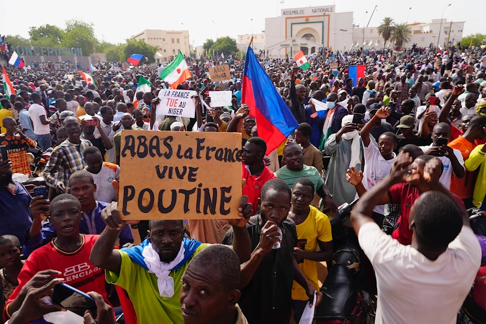 33471557_web1_230801-CPW-Canada-condemns-Niger-coup-streets_1