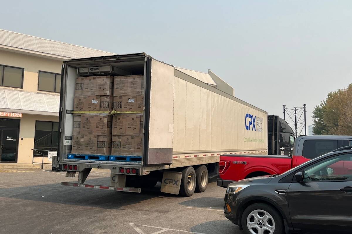 Semi-truck of goods delivered to COFB. (Facebook)