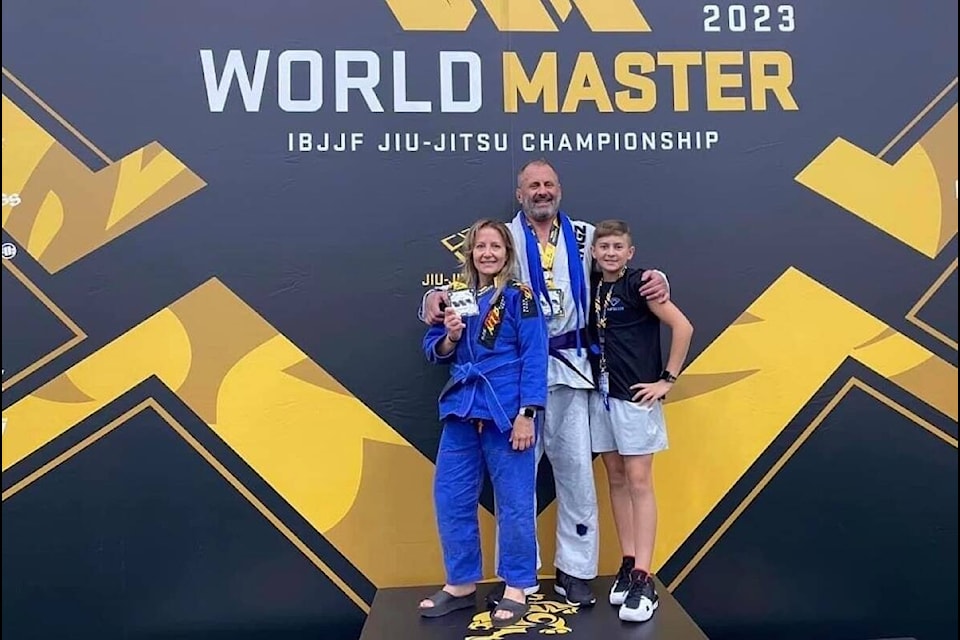 Jeff Cuthbert (middle) won the gold at the Blue Belt Men’s Super-Heavyweight Brazilian Jiu-Jitsu Federation’s Jiu-Jitsu Con, along his girlfriend, Piera Chiola (left), and son, Owen Cuthbert-Mayrhofer (right) on Labour Day weekend in Las Vegas, Nevada. (Contributed)