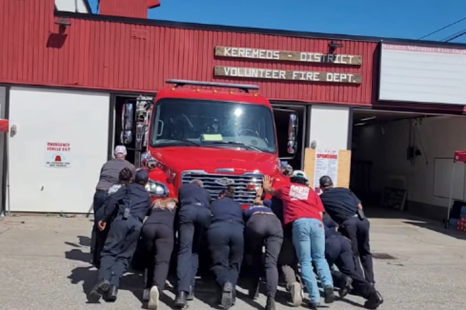 The ceremonial push-in of the Keremeos Volunteer Fire Department's new engine on June 28. 